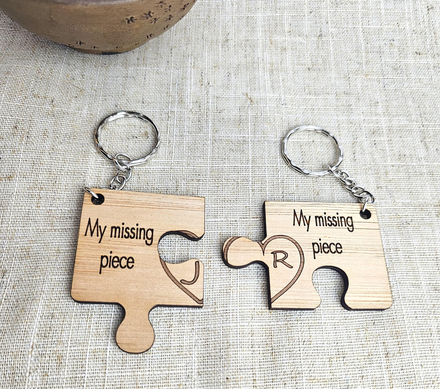 2 missing piece keyrings. - Slice of Wild